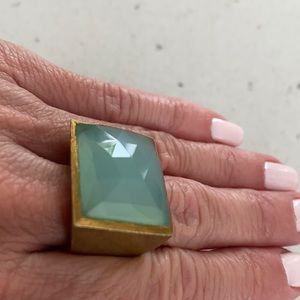 Golp plated ring with rectangle light blue stone